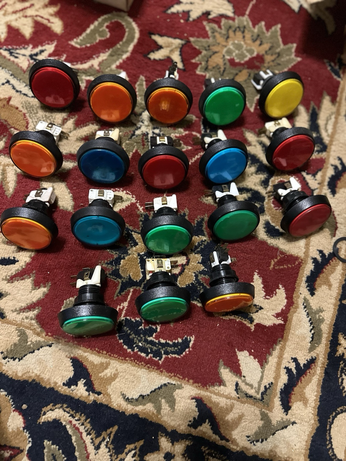 18 Round Push Buttons Complete With Switches In Assorted Colors.