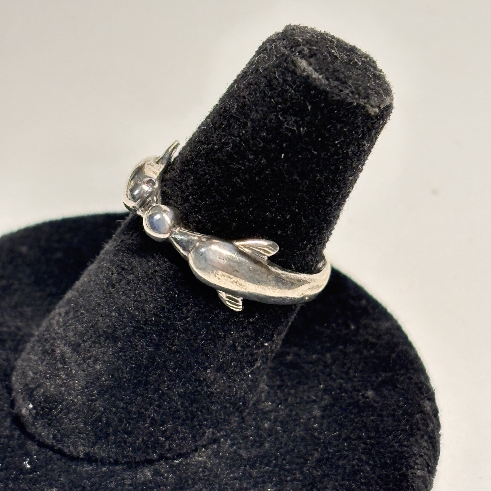 Dolphins pair with beach ball open back ring size 4 toe ? marked .925 MWS OR SMW