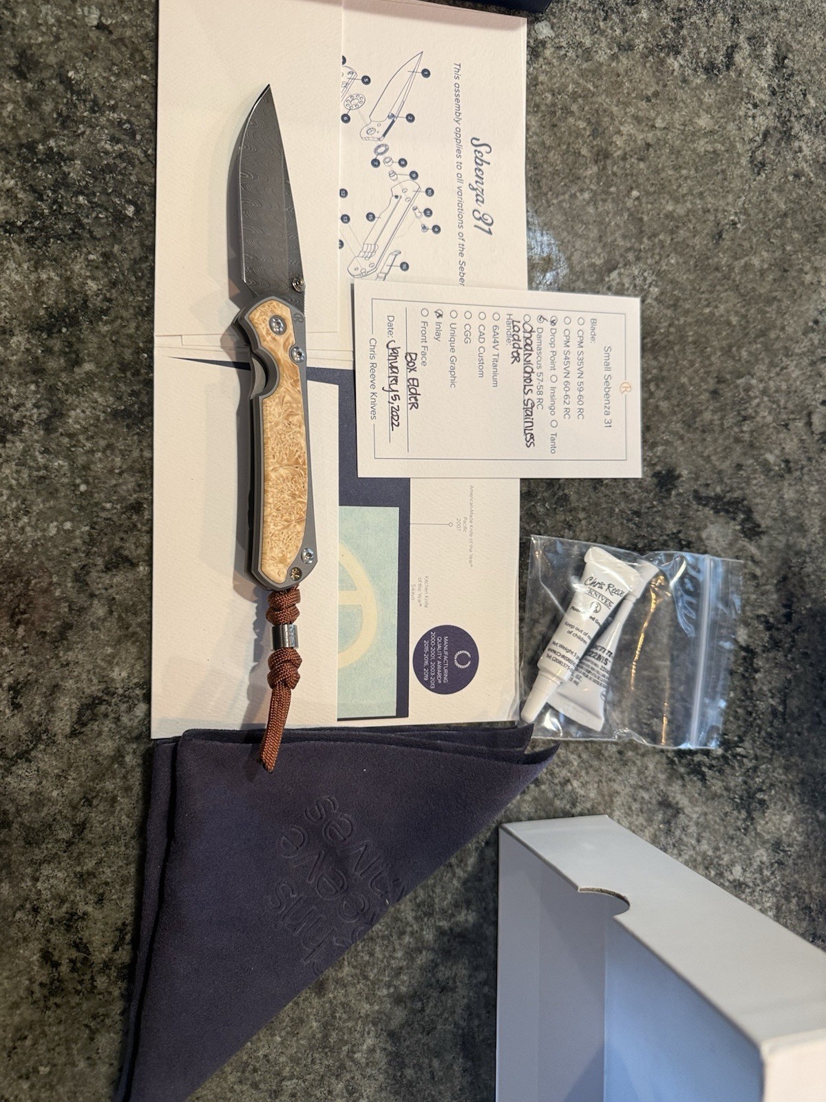 Chris Reeve Small Sebenza 31 Box Elder Titanium Damascus Drop Point Knife