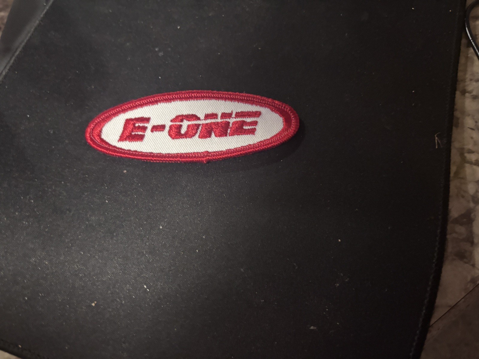 E- ONE HEAVY RESCUE METAL EMBLEM AND E-ONE PATCH