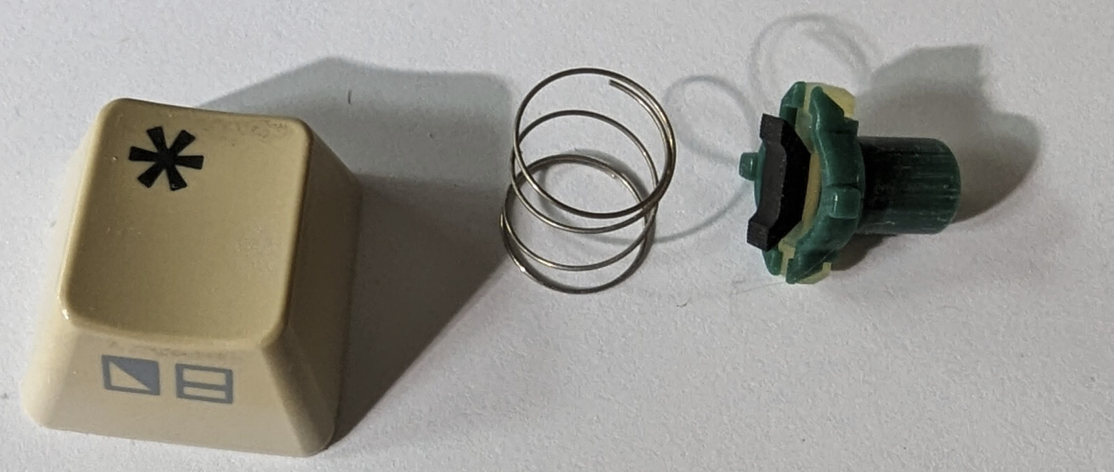 Commodore 128 (not D version) replacement '*' keycap w/plunger and spring