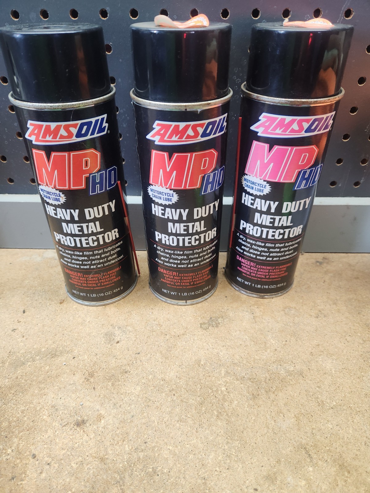 3  15oz Cans Of AMSOIL Heavy Duty Metal Protector