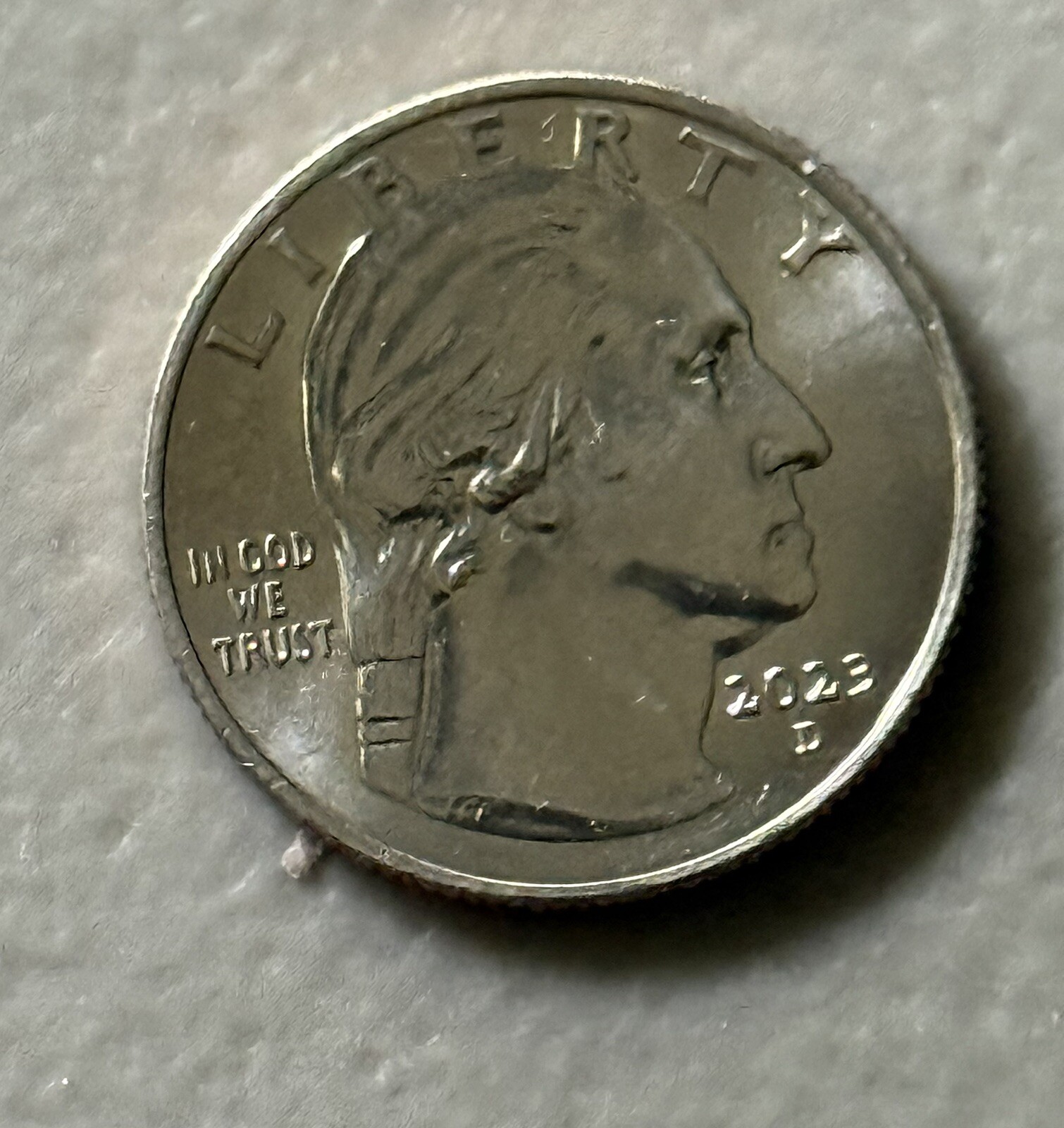 ERROR - 2023 D - Jovita Idar Women's Quarter  Reads “In Cod We Trust”