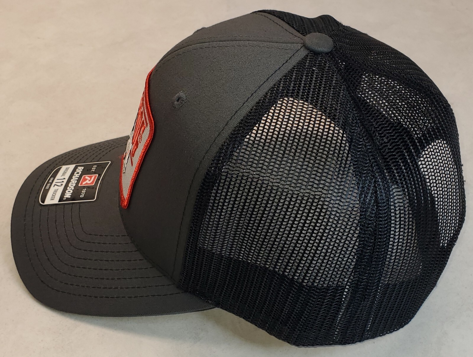 Bush Hog Patch on Richardson 112 Trucker Hat Snapback Charcoal/Black