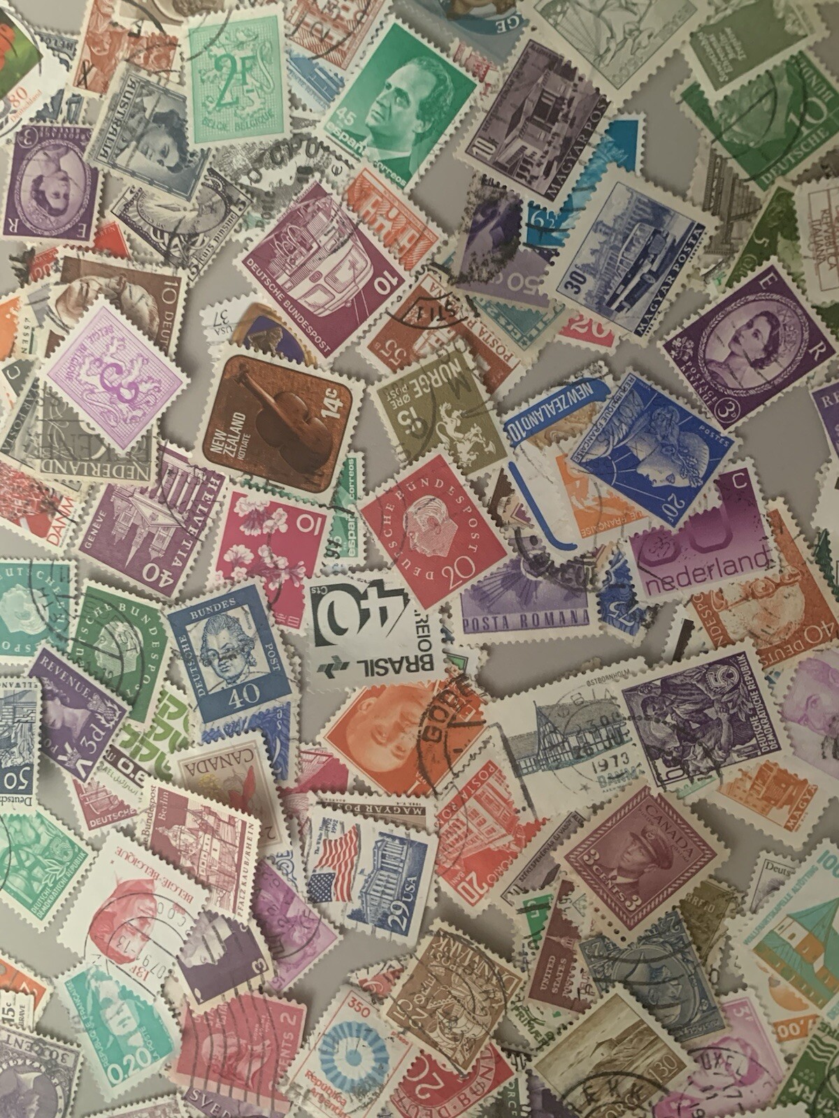 100+ Different Small Worldwide Stamps