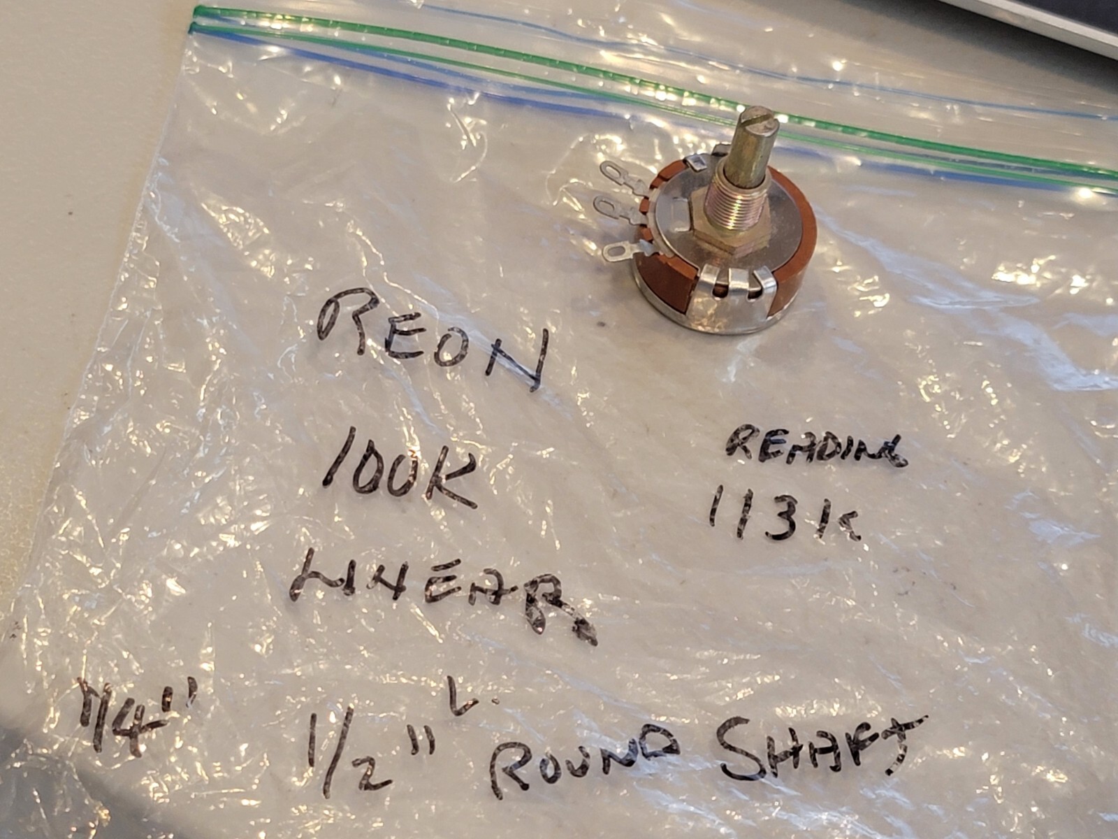 NOS  REON 100KK  LINEAR POTENTIOMETER 1/4" Shaft  1/2" Long Reading 113K