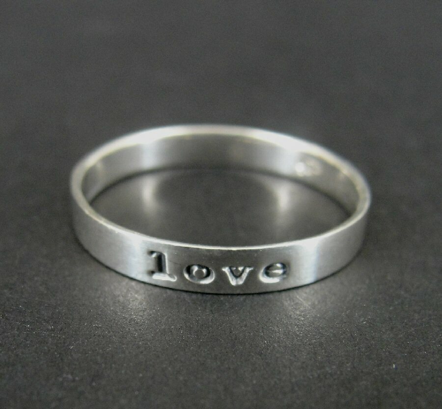 Ring Sterling the word LOVE Silver Sterling 925 Size 7.75 Ring Band