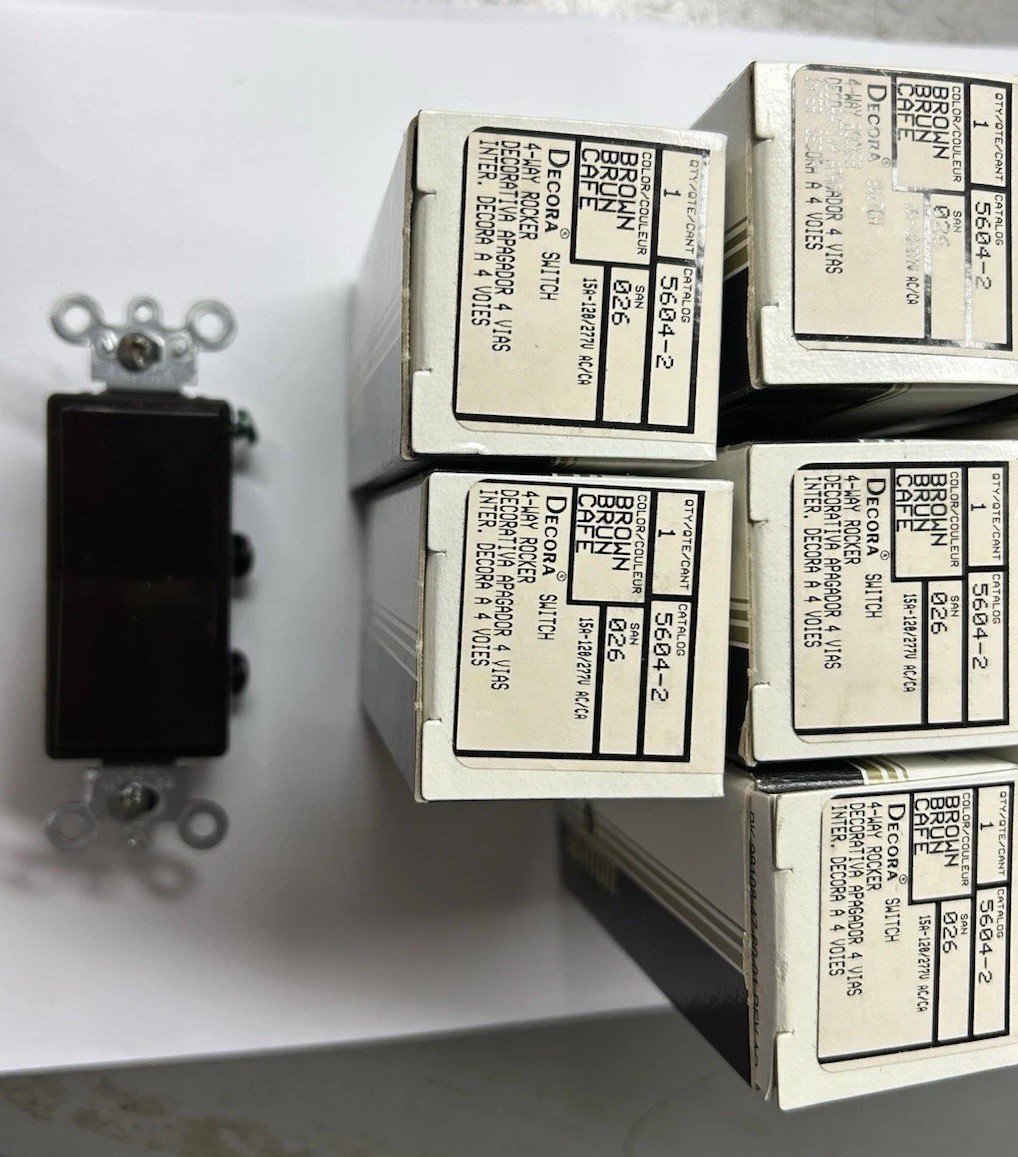 (8) Leviton 5604-2    4 Way Decora Switches brown