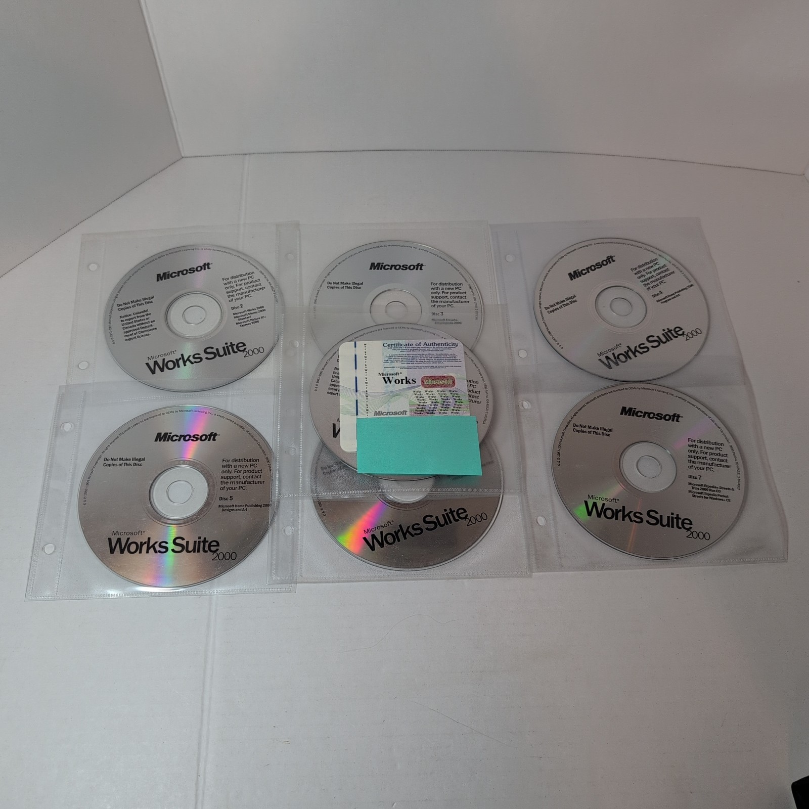 Microsoft Works Suite 2000 Complete 7 Disc +Tutorial PC CD-Rom Set w/Product Key