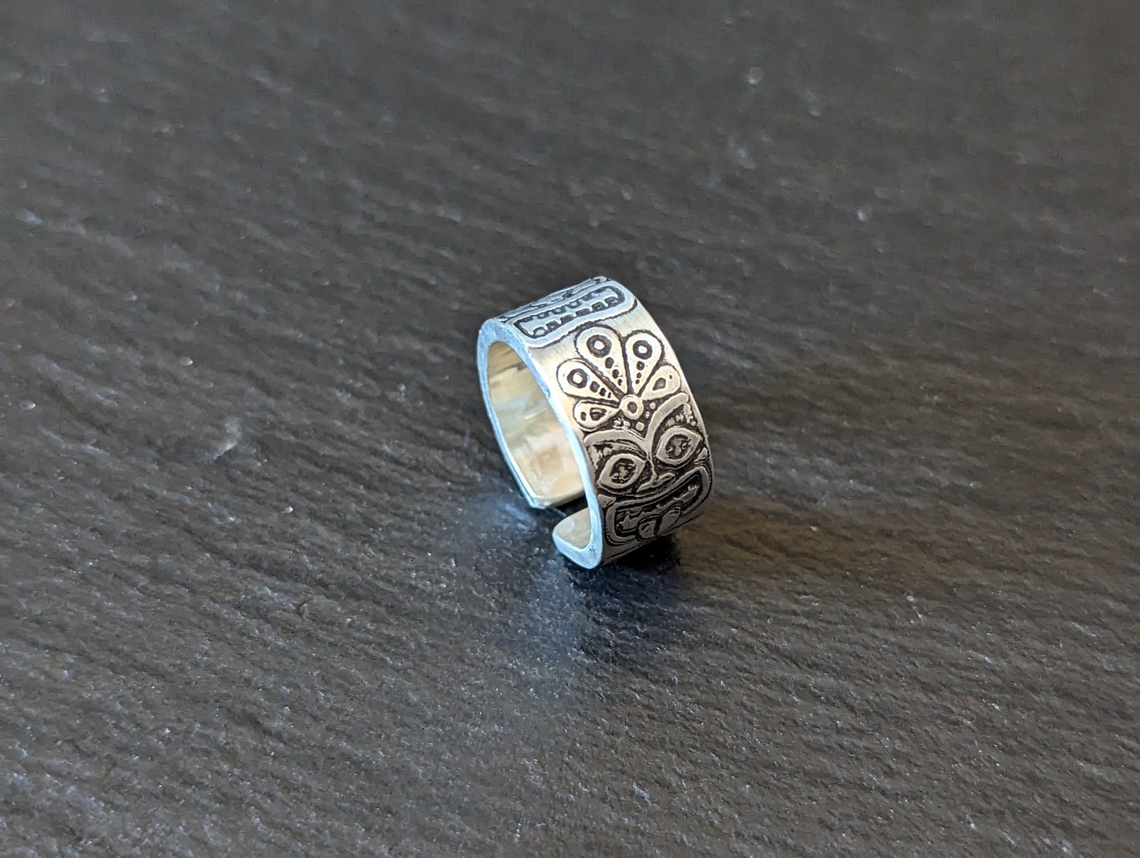 Thick sterling silver ring with tiki gods - handmade - open design