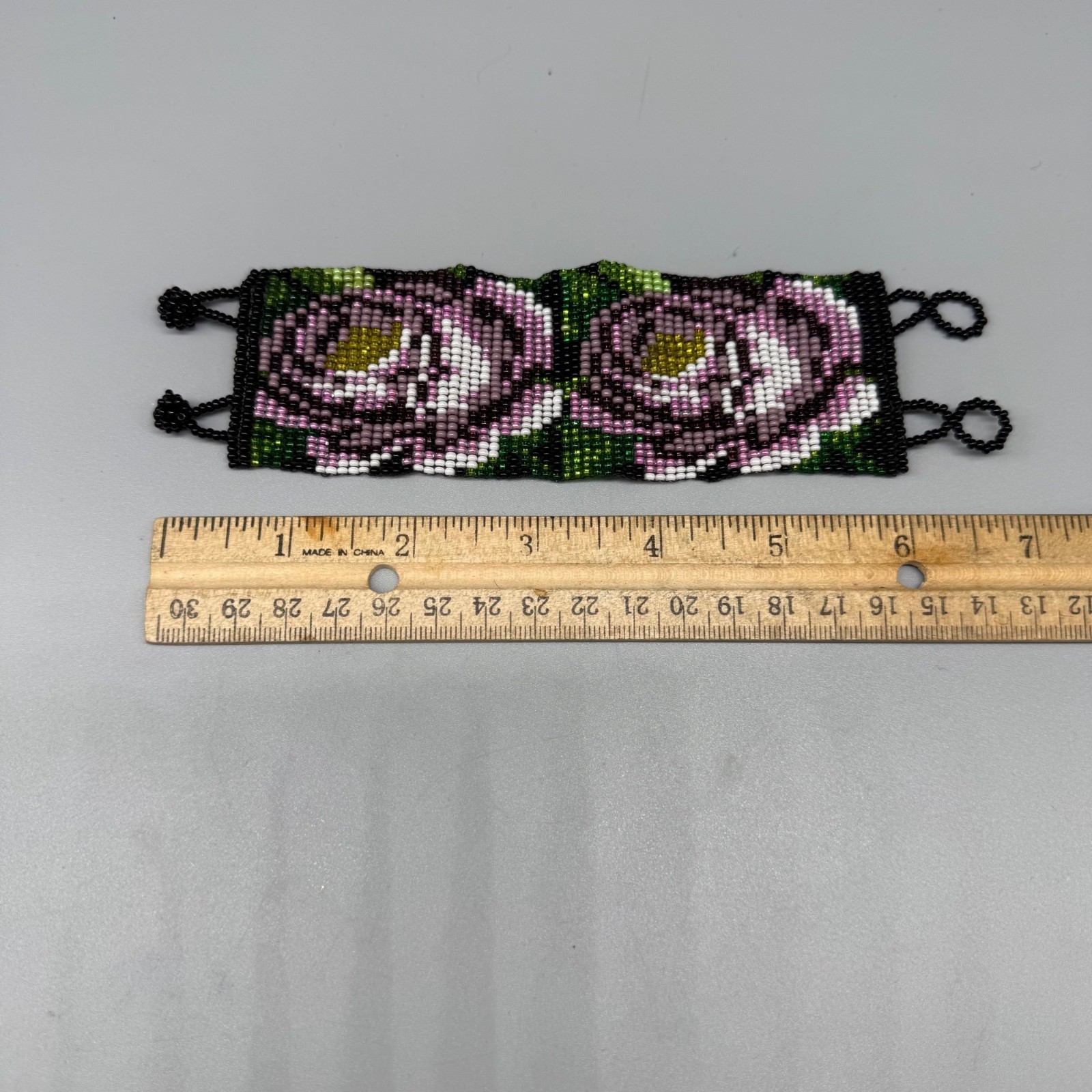 Handcrafted Beaded Bracelet With Purple Floral Design & Adjustable Loop Closures