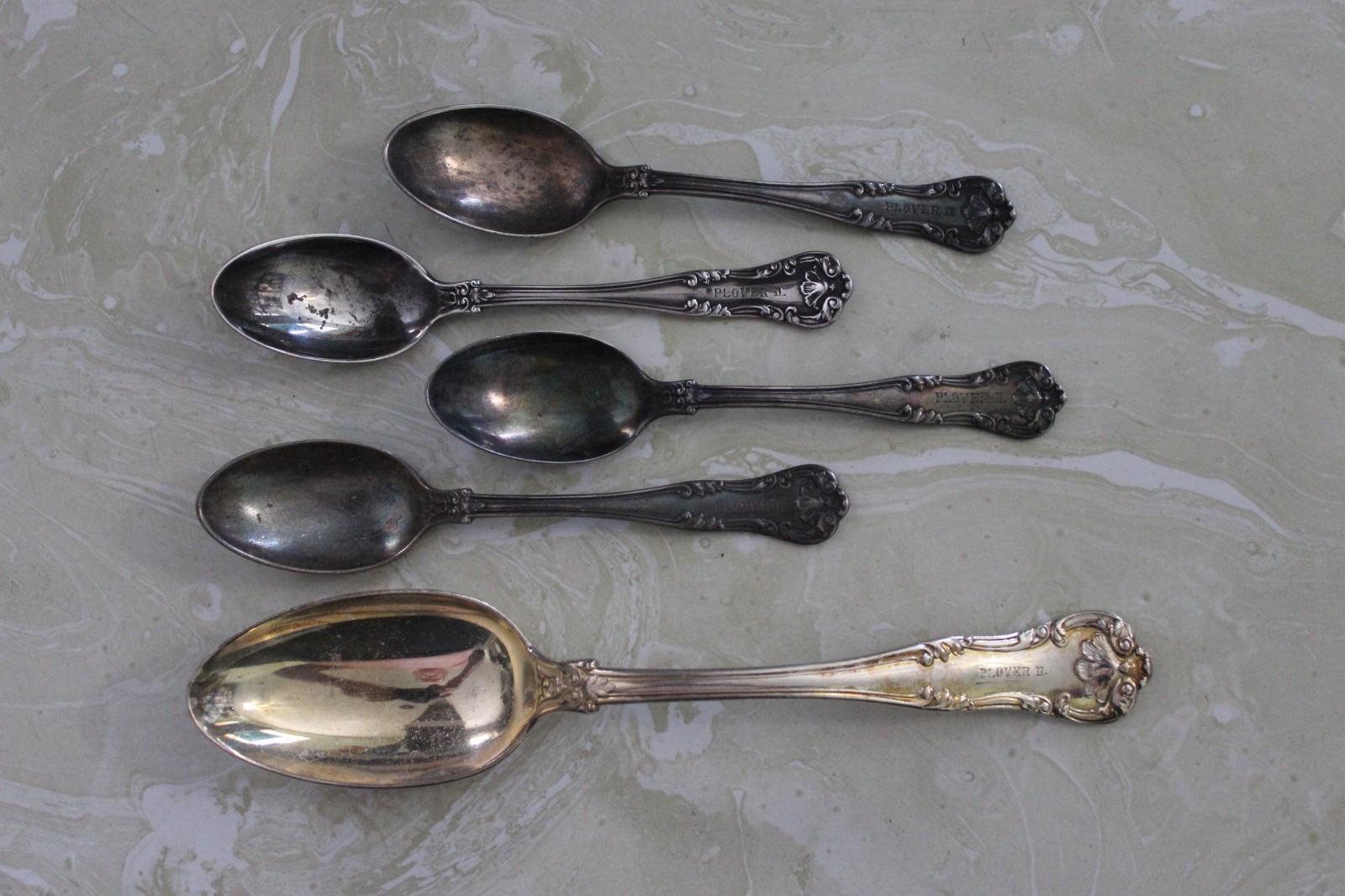 LOT OF ( 5 ) SILVER PLATED FLATWARE PIECES MARKED PLOVER II