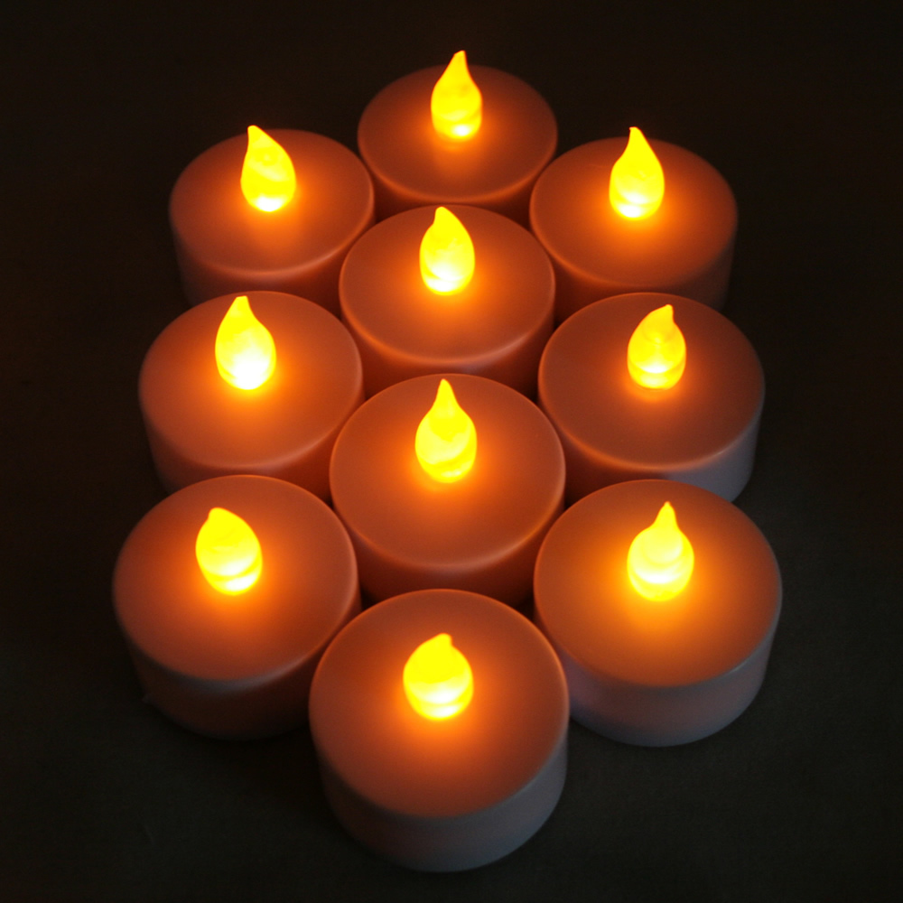 NEW 10 FLICKER AMBER LIGHT FLAMELESS LED TEALIGHT TEA CANDLES