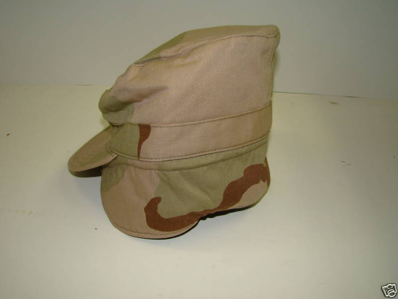 Tan Camouflage Hat with Ear Flaps.
