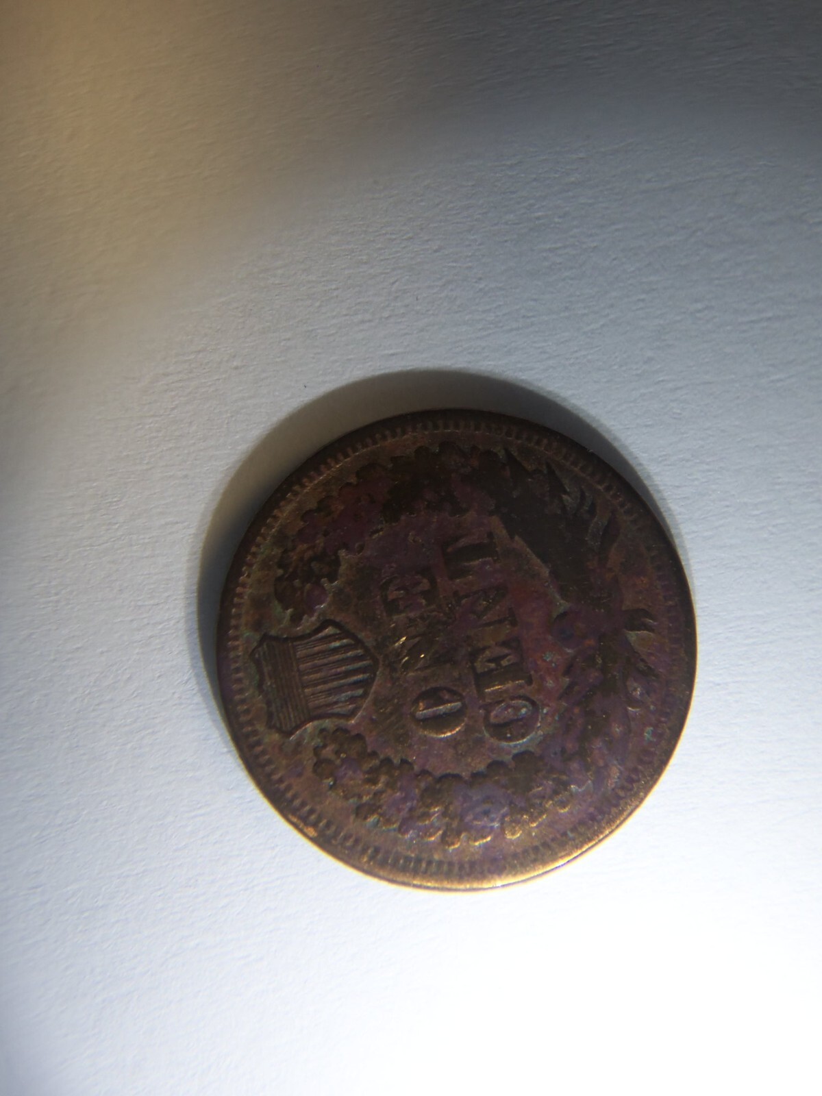 A RARE 1869 INDIAN HEAD PENNY