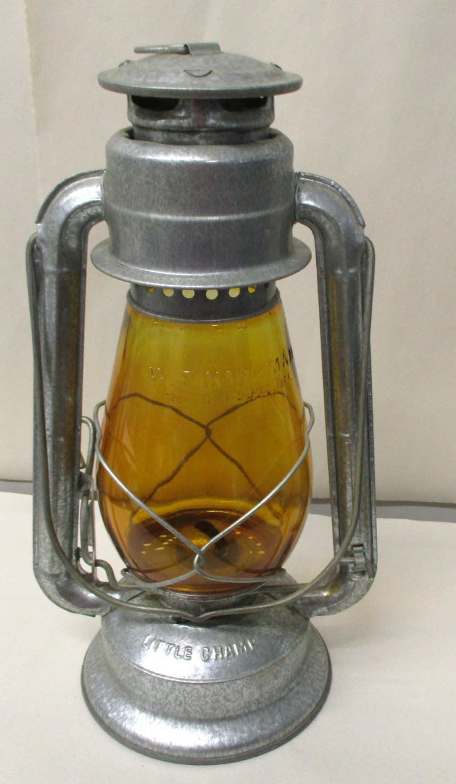 VINTAGE W. T. KIRKMAN NO. 1 C.B. LITTLE CHAMP LANTERN WITH AMBER GLOBE