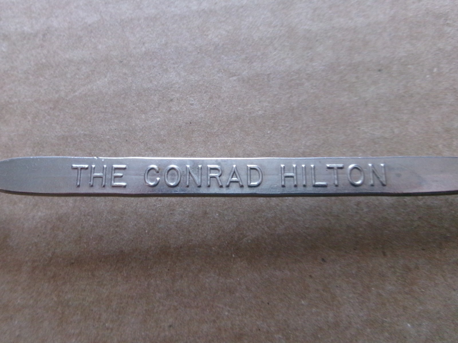 Vintage Conrad Hilton Spoon and Bottle Opener