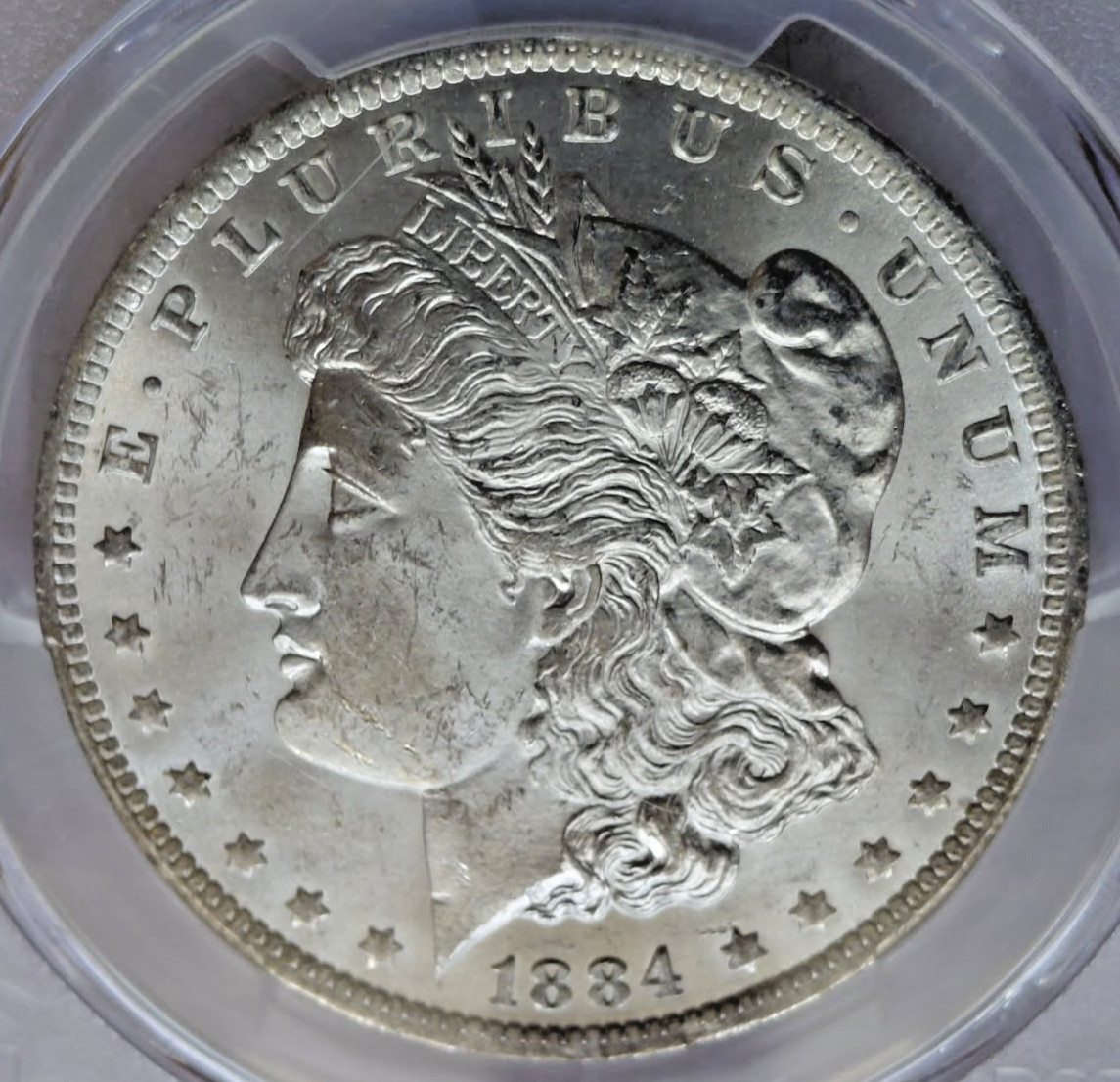 1884-O PCGS-MS-64 Morgan Silver Dollar BLAST WHITE GREAT CARTWHEELS Clean Fields