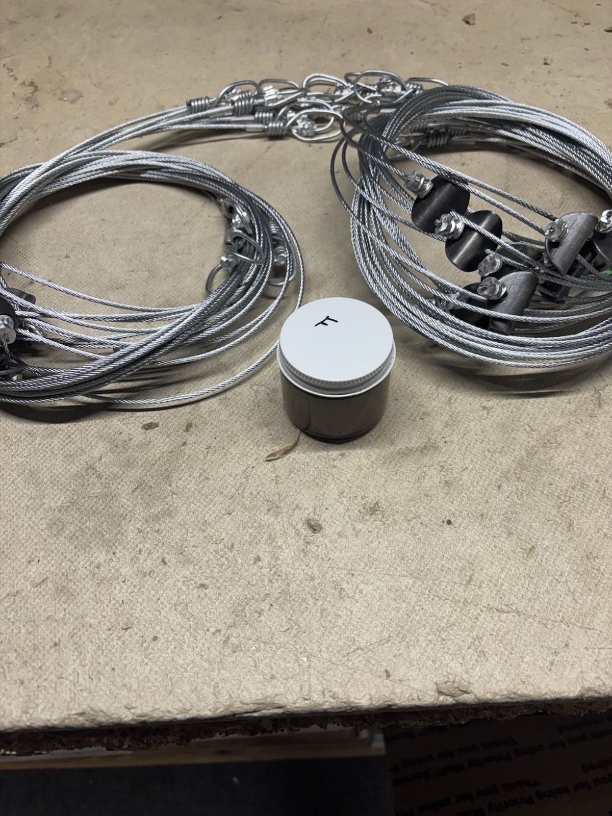 beaver snares, 2 dozens & A 2 Ounce Bottle Of Beaver Lure