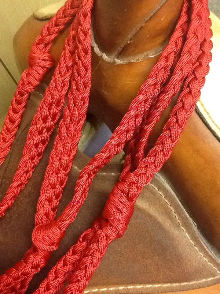 red paracord barrel reins with grip knots
