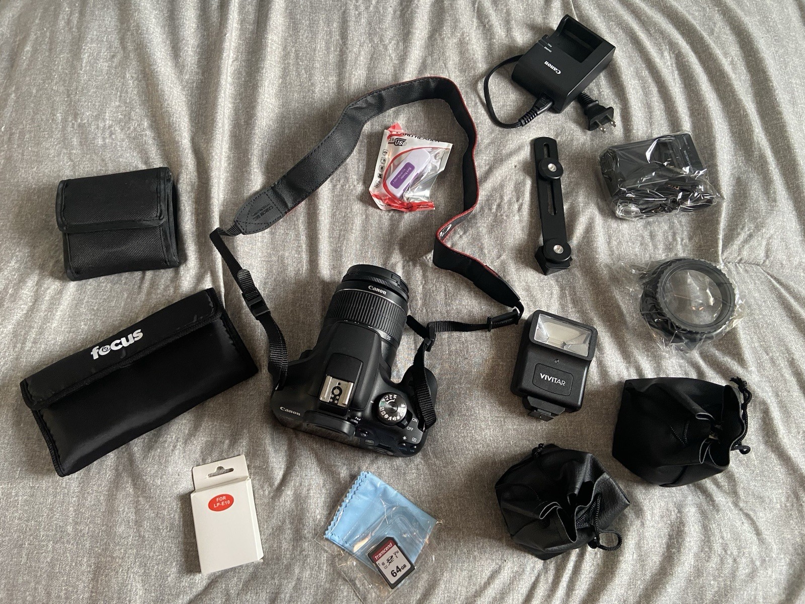 Canon EOS 2000D Camera Bundle with Lenses, Flash, Bag, Memory Card, Accessories