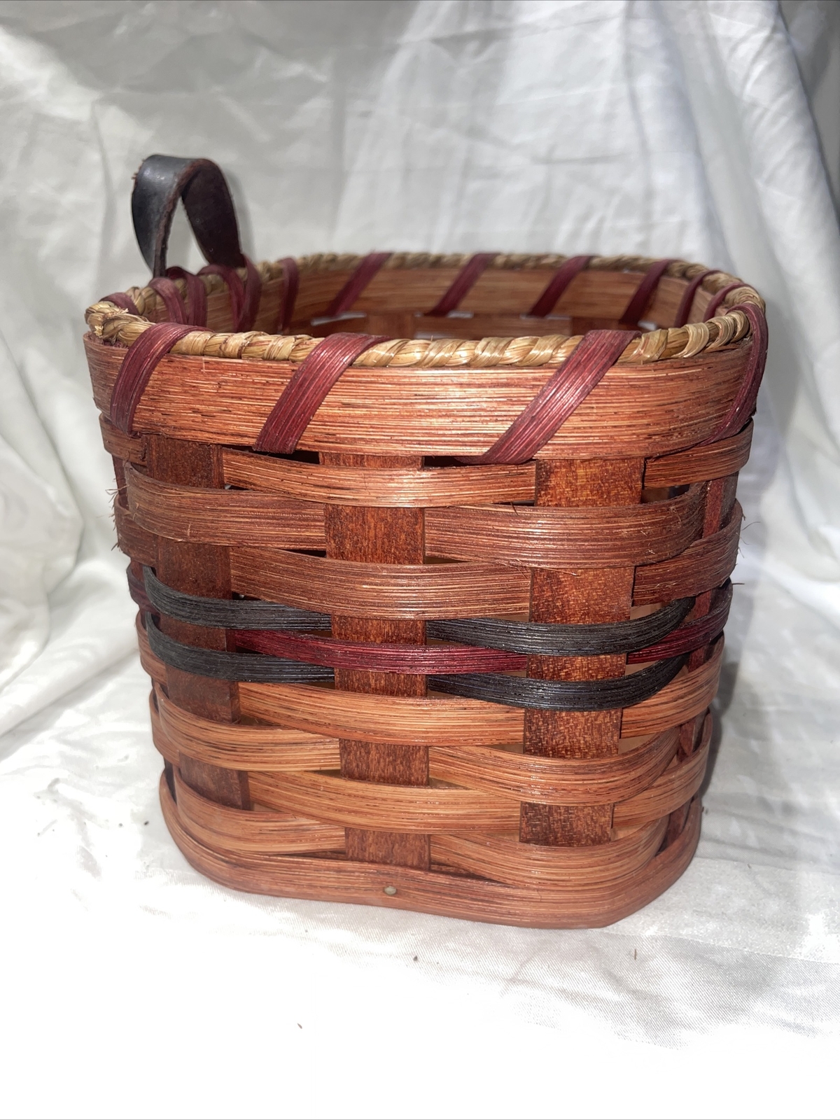 Woven basket With Wooden Bottom