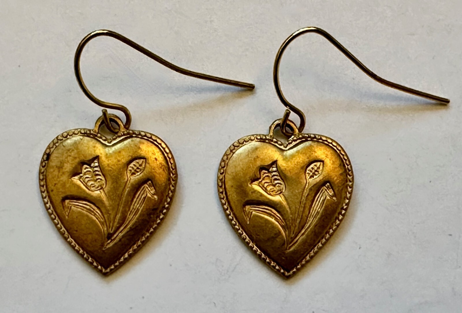 Vintage brass heart with flower charm  1/2 of  1" earrings 1"