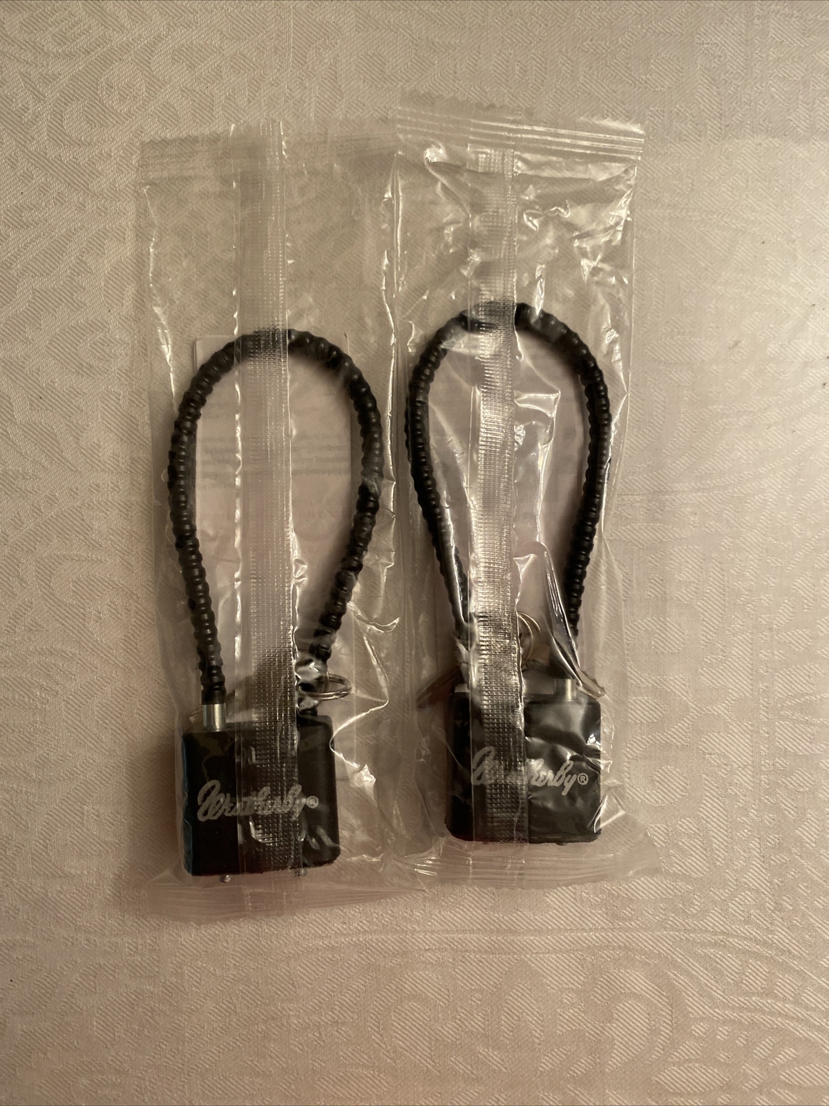Wheatherby Safety Firearm Handgun Safety 8" Cable Lock Brand New 30mm 2 Locks