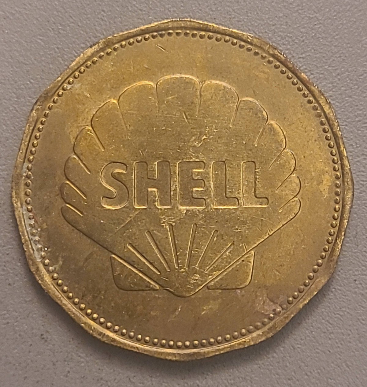 Vintage Shell Man in Flight Louis Bleriot 1909 Plane Metal Token - Dodecagonal