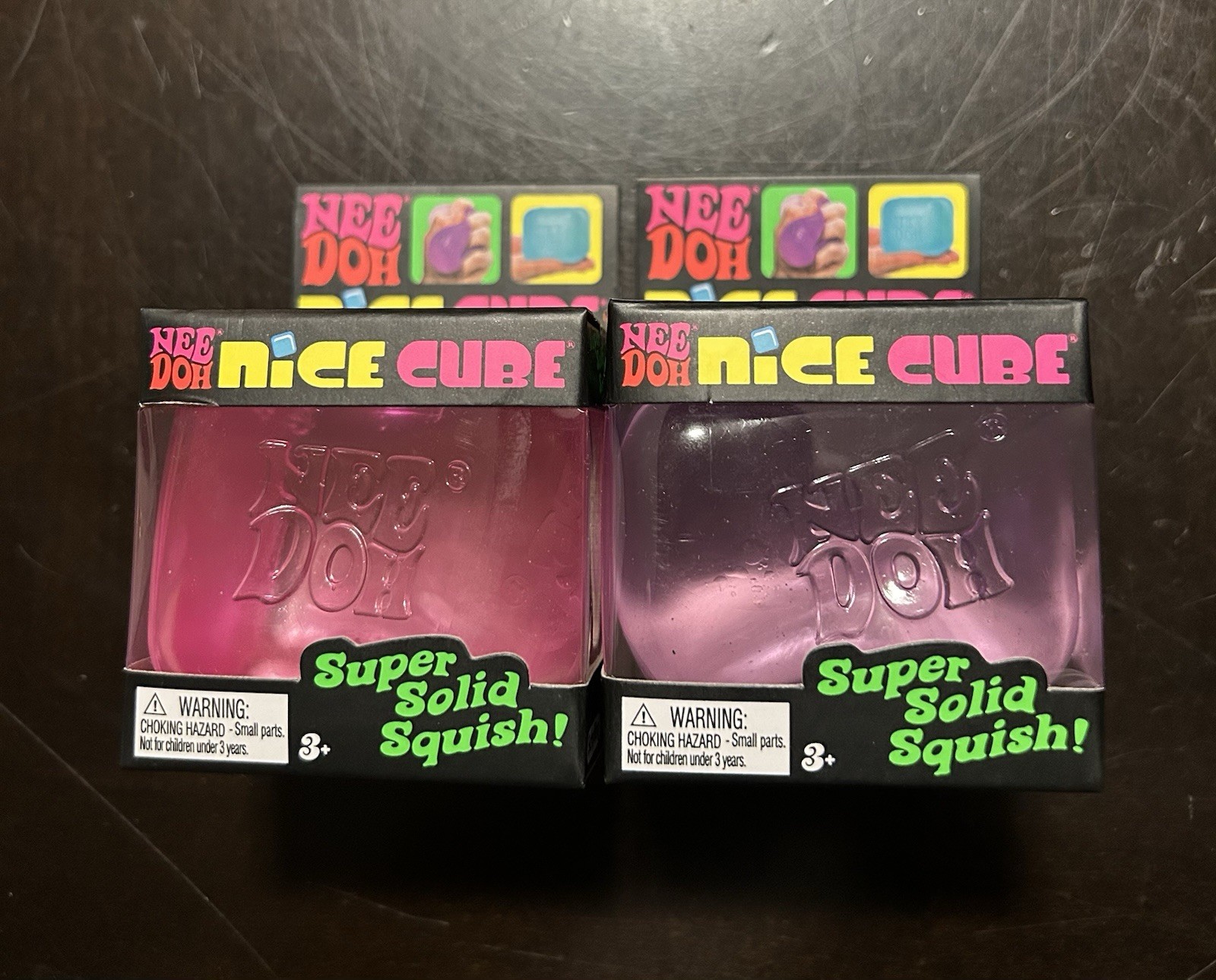 Brand New - Nee Doh - Nice Cube Super Solid Squish! - Lot of 2 - Purple & Pink