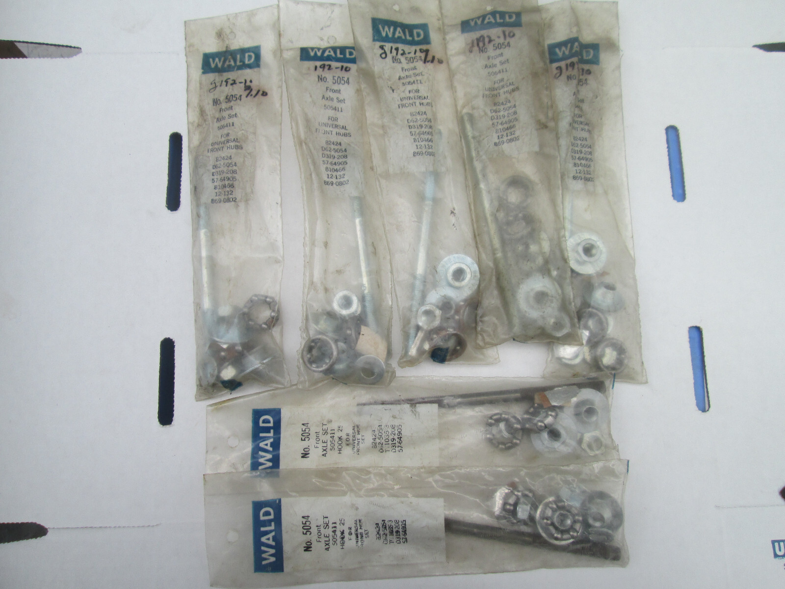 WALD FRONT AXLE SET # 5054 NEW OLD STOCK COMPLETE IN PACKAGING ONE BID ONE SET