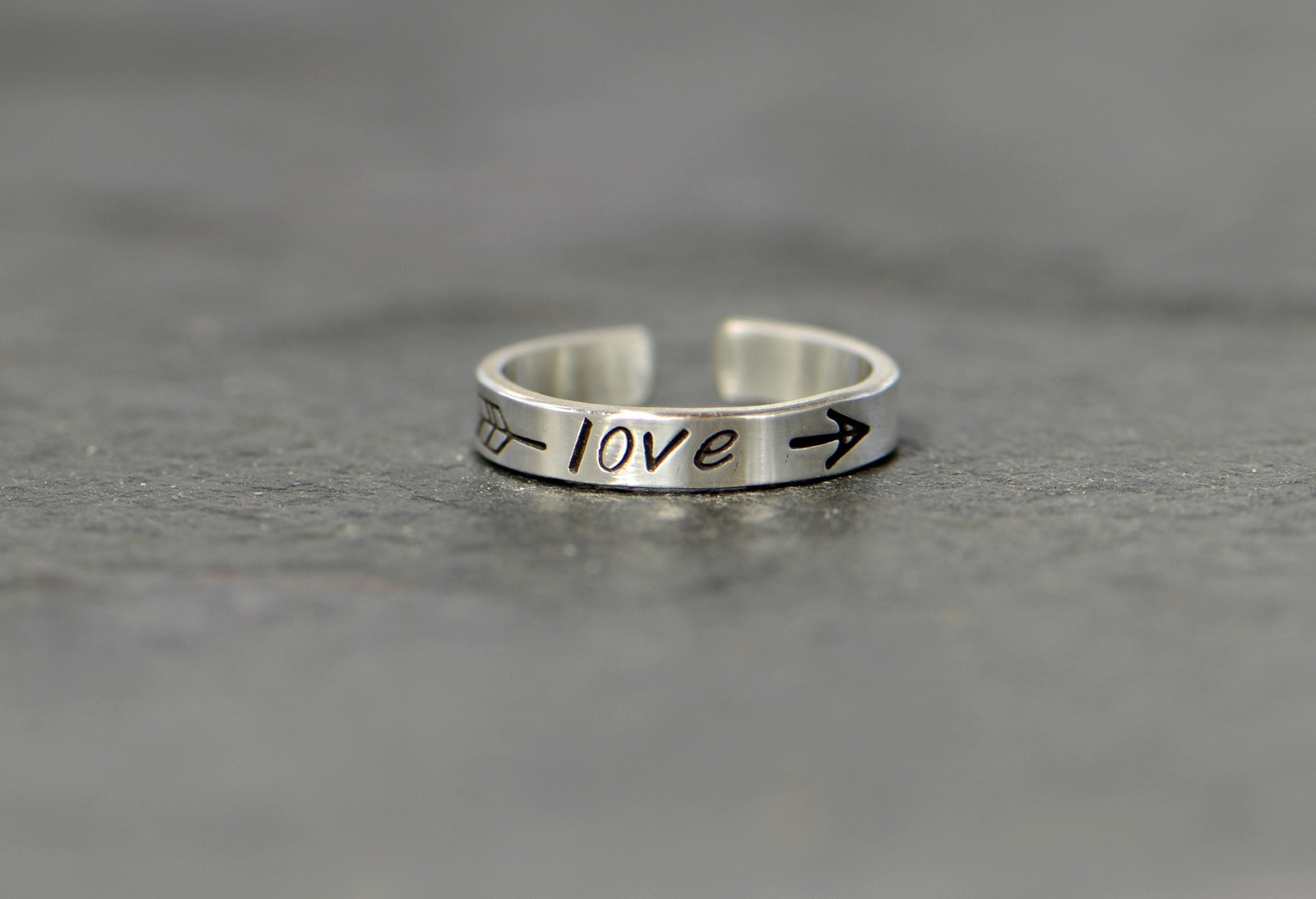dainty sterling silver toe ring with arrow and the word love - dainty midid