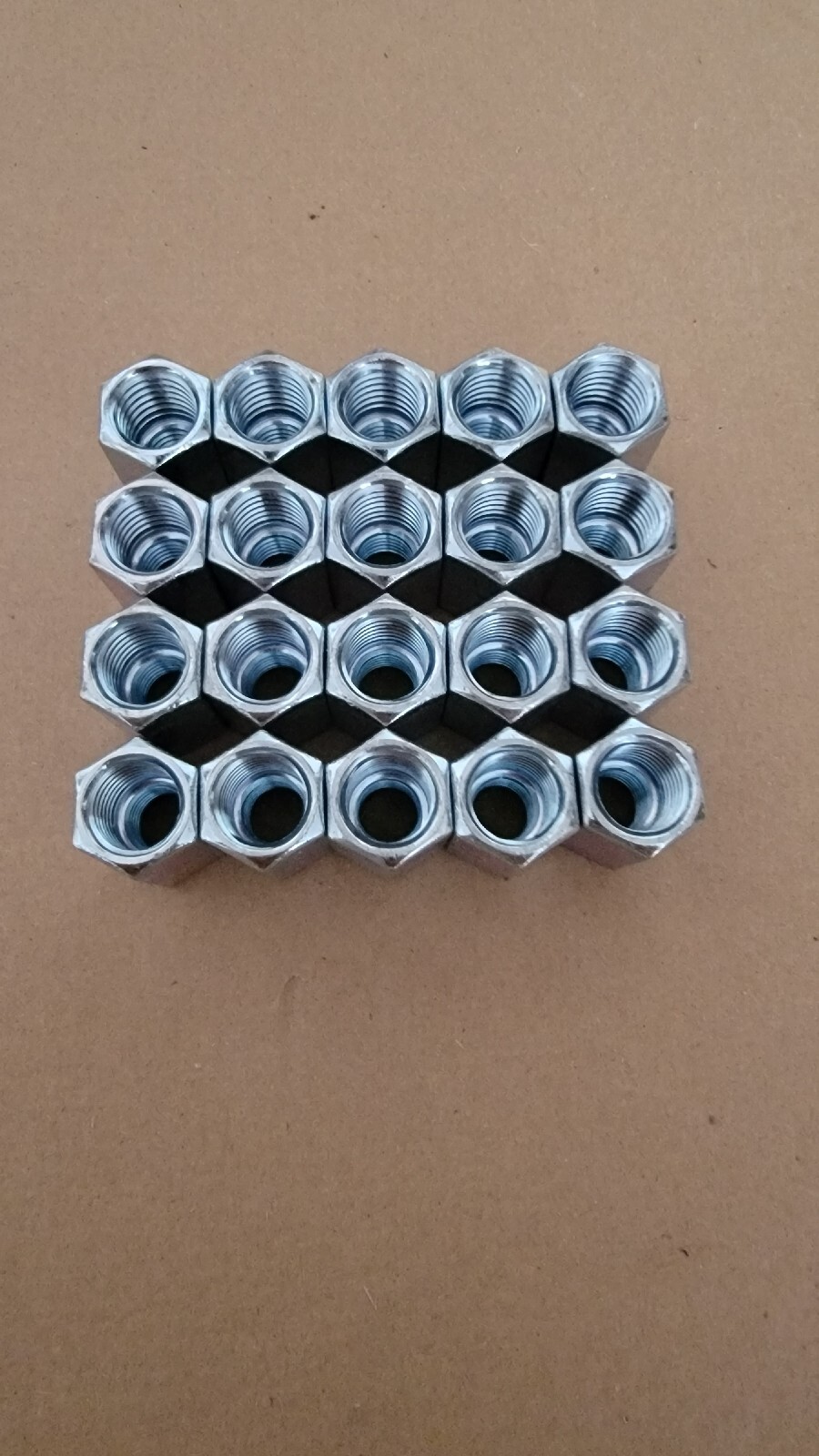 20 peices 5/8-11 to 1/2-13 x 1 1/4" Long Reducer Coupling Nut - Zinc Plate