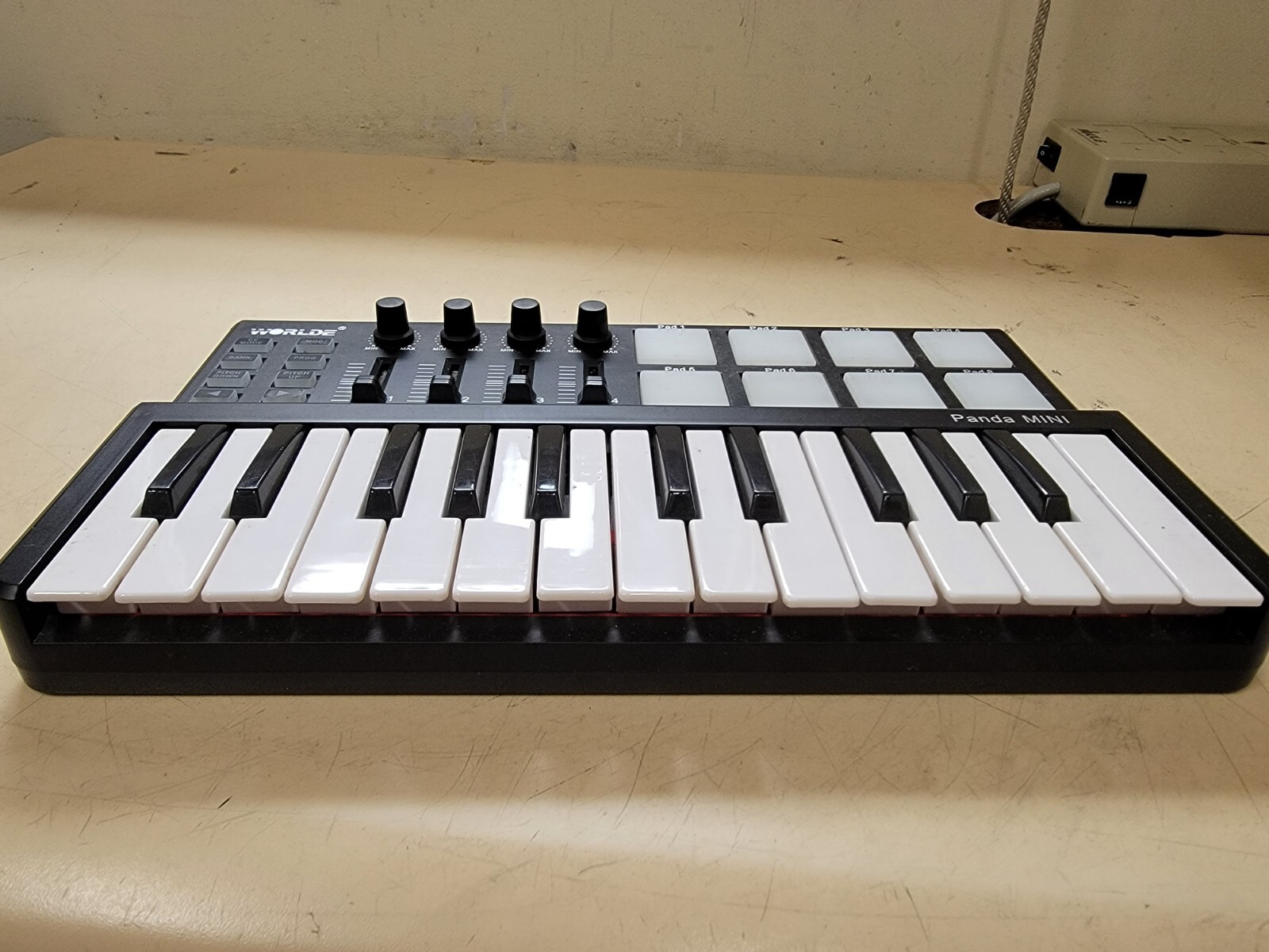 Worlde Panda Mini 25-Key USB Keyboard Drum Pad MIDI Electric Controller