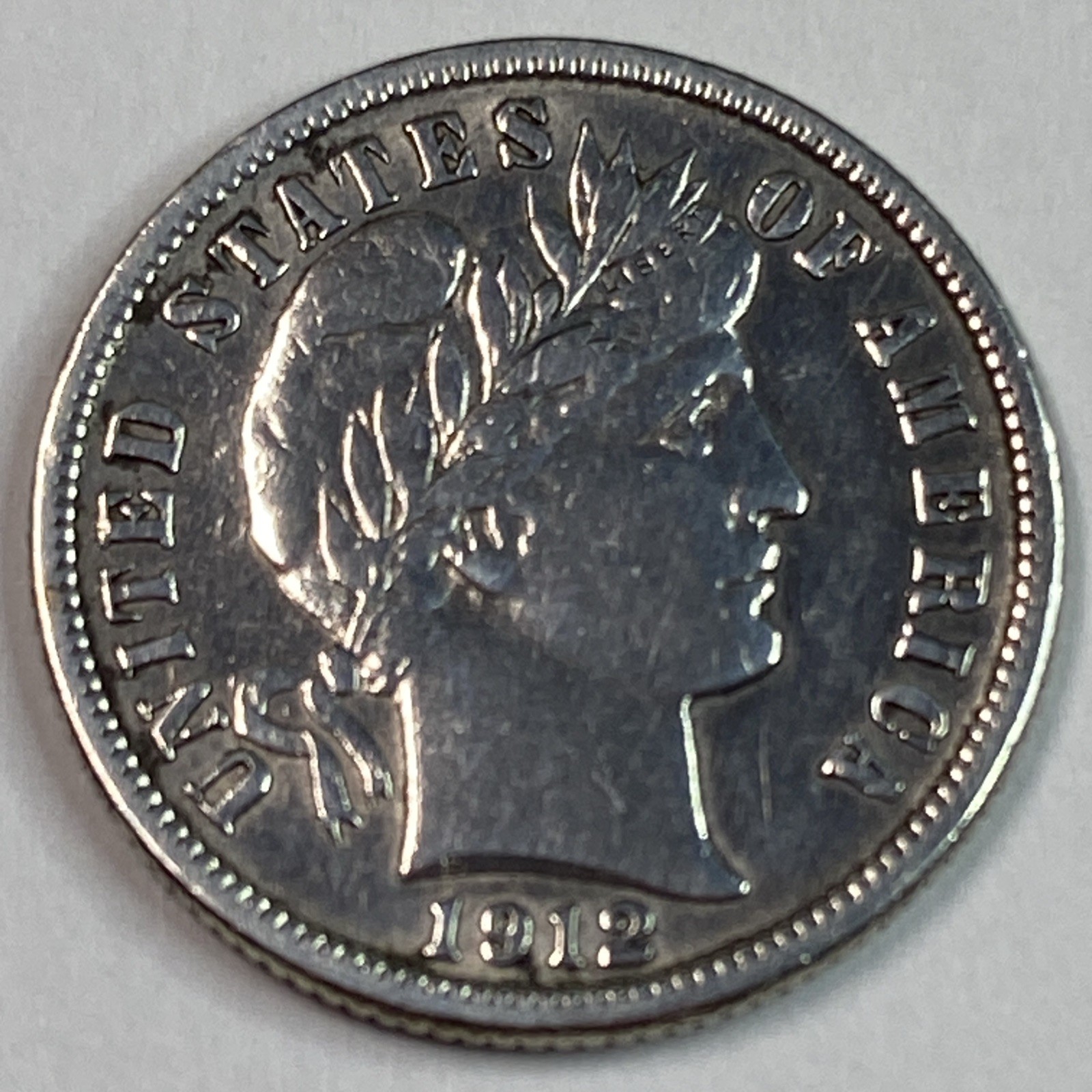1912 D  Barber Dime  10C Silver Coin.  Brilliant White AU++++.