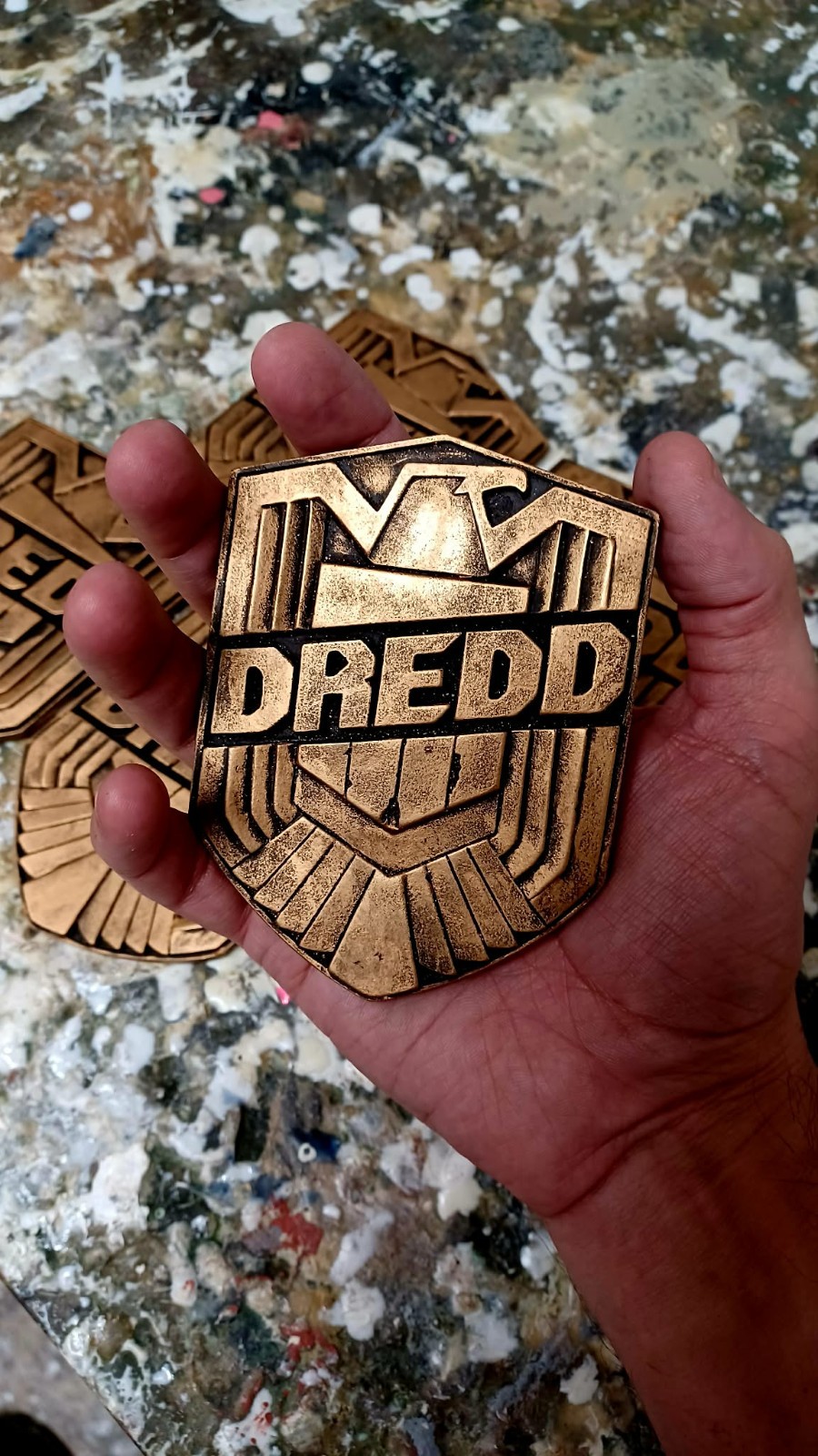 SCREEN CAST Dredd badge movie prop in resin with weathered gold finish