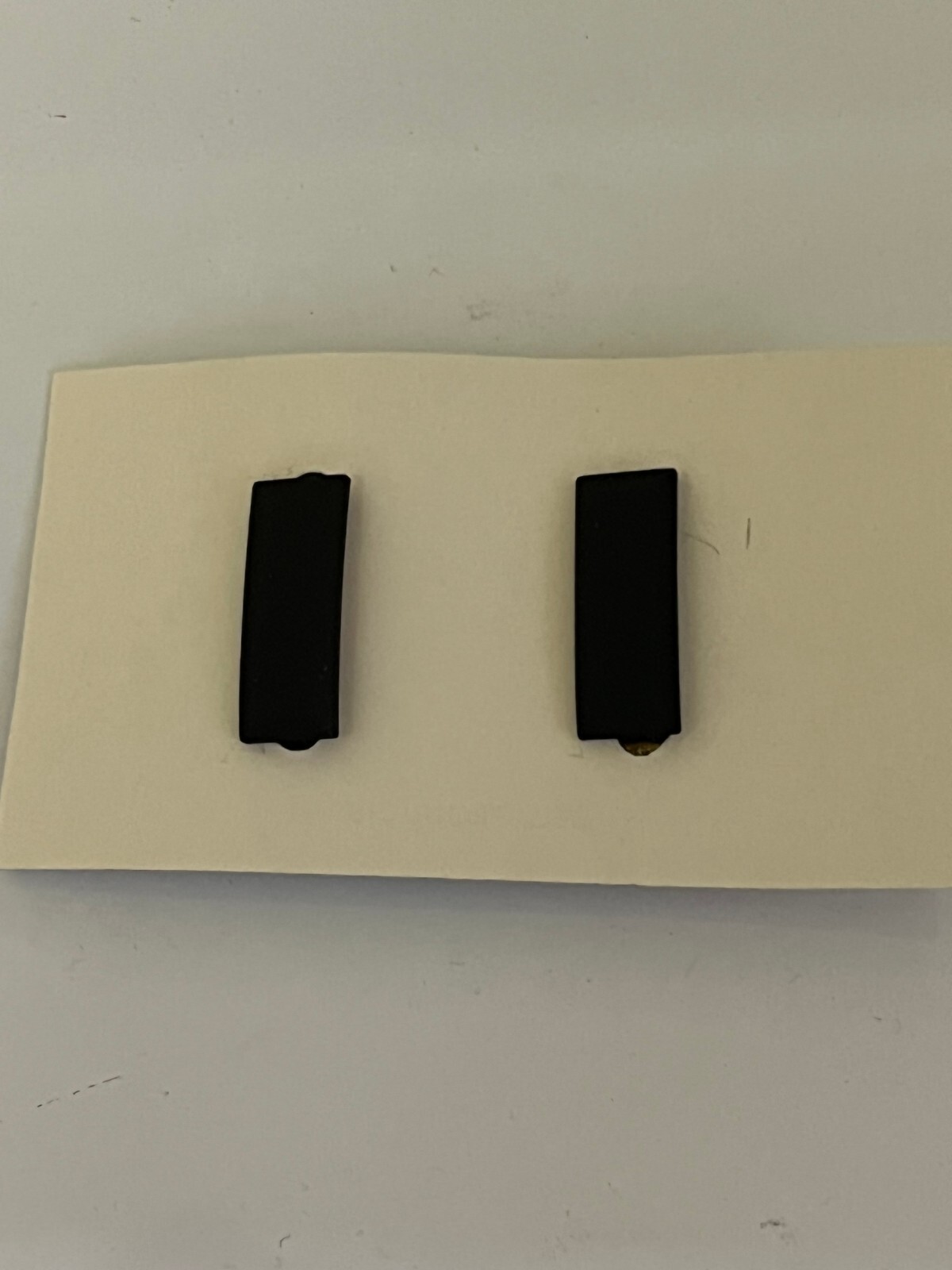 US ARMY 1ST LIEUTENANT PAIR OF BLACK SUBDUED ARMY ISSUE RANK INSIGNIA