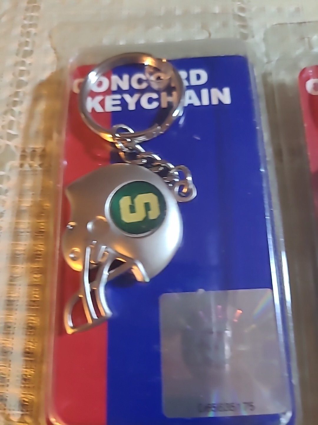 TWO CONCORD FOOTBALL KEYCHAINS