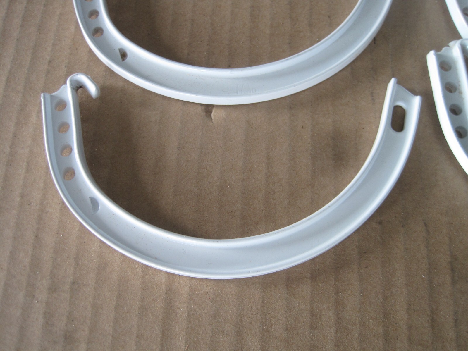 Lot of (5) Berger 5" stamped half round gutter supports w clips, screws & nuts