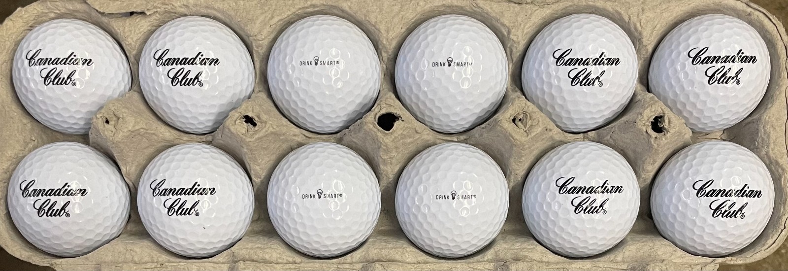 One dozen (12) novelty/souvenir golf balls with Canadian Club logo FREE SHIPPING
