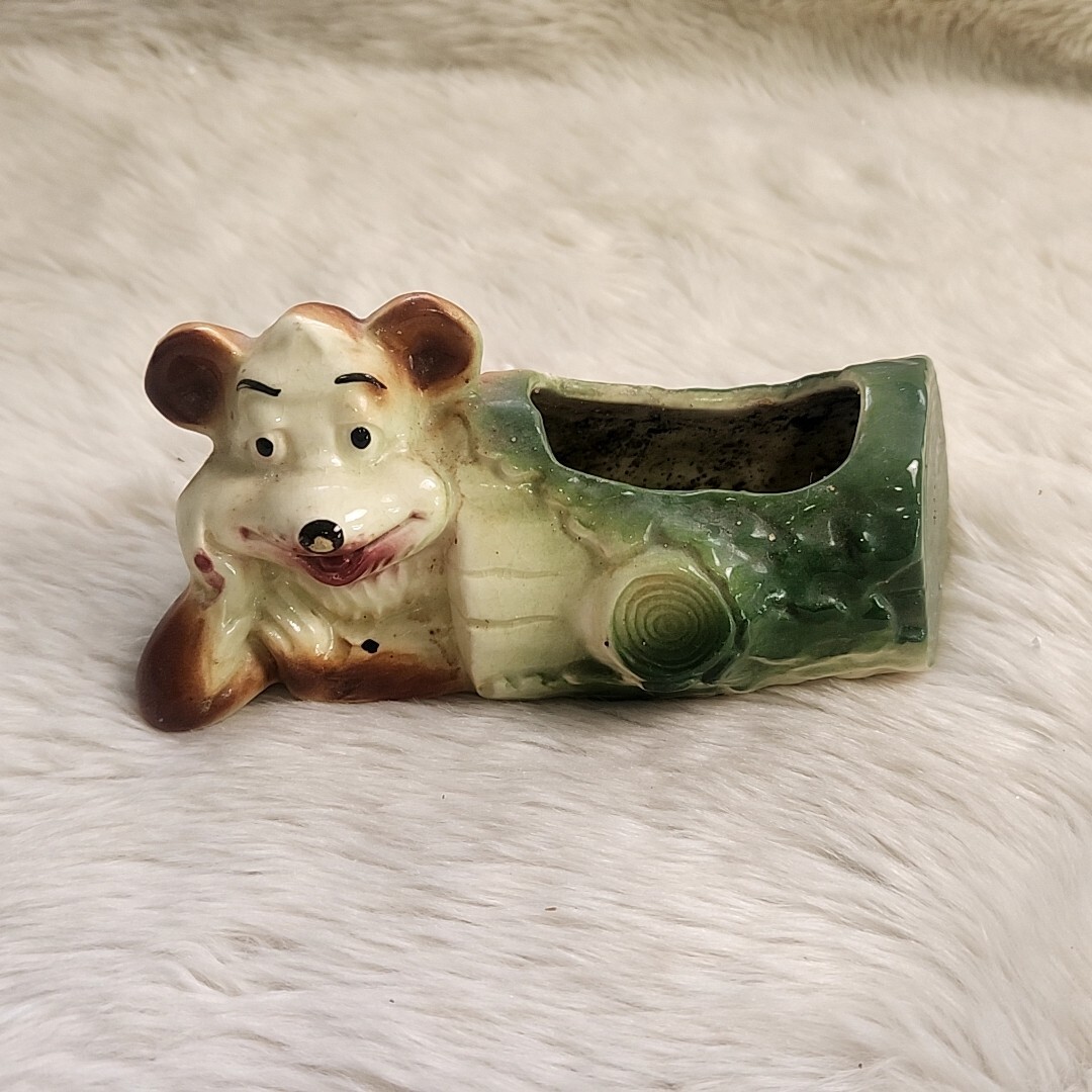 Vintage Art Pottery Planter of a Bear Resting in a Log