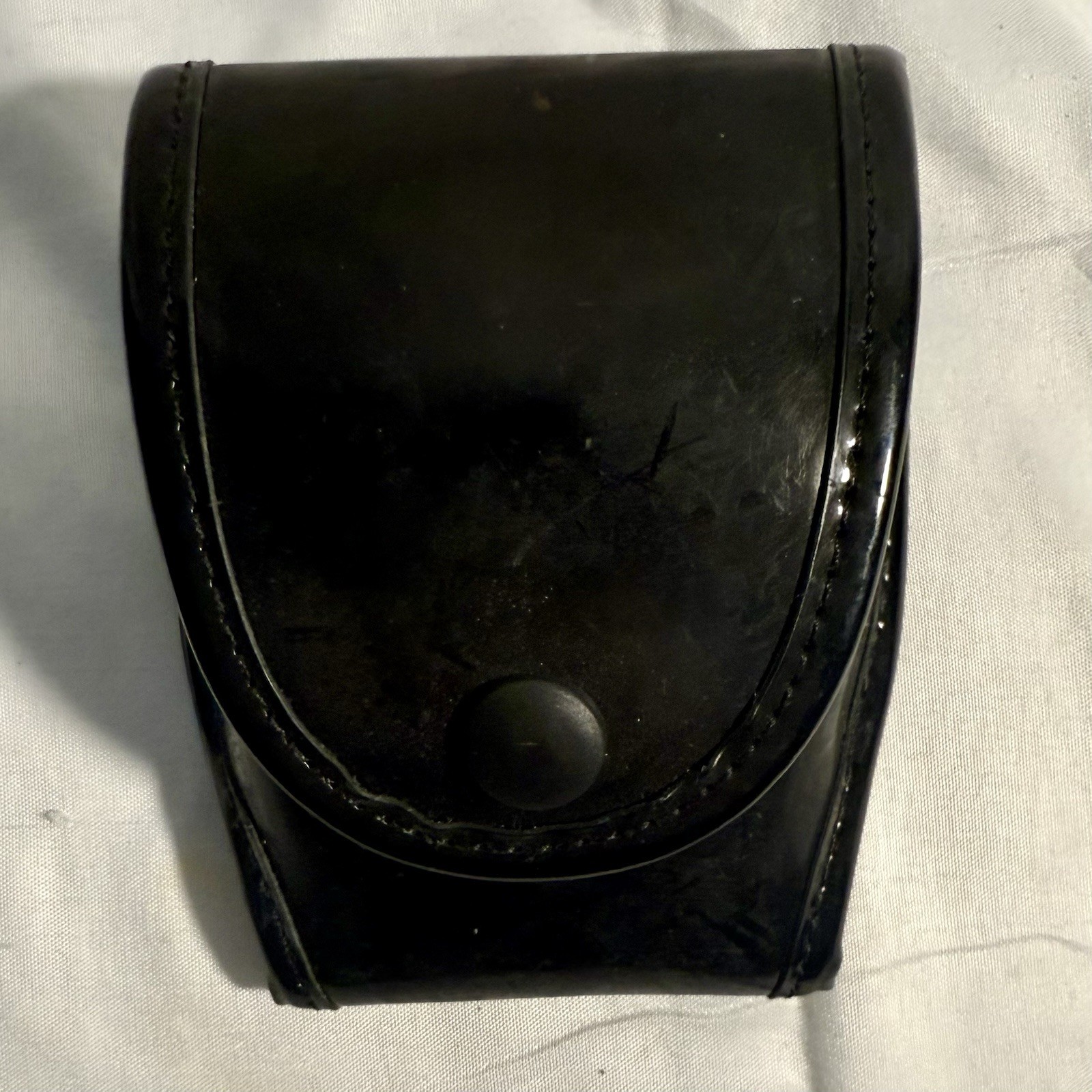 SIDEKICK Handcuff Holster by Michaels of Oregon Hi-gloss Black