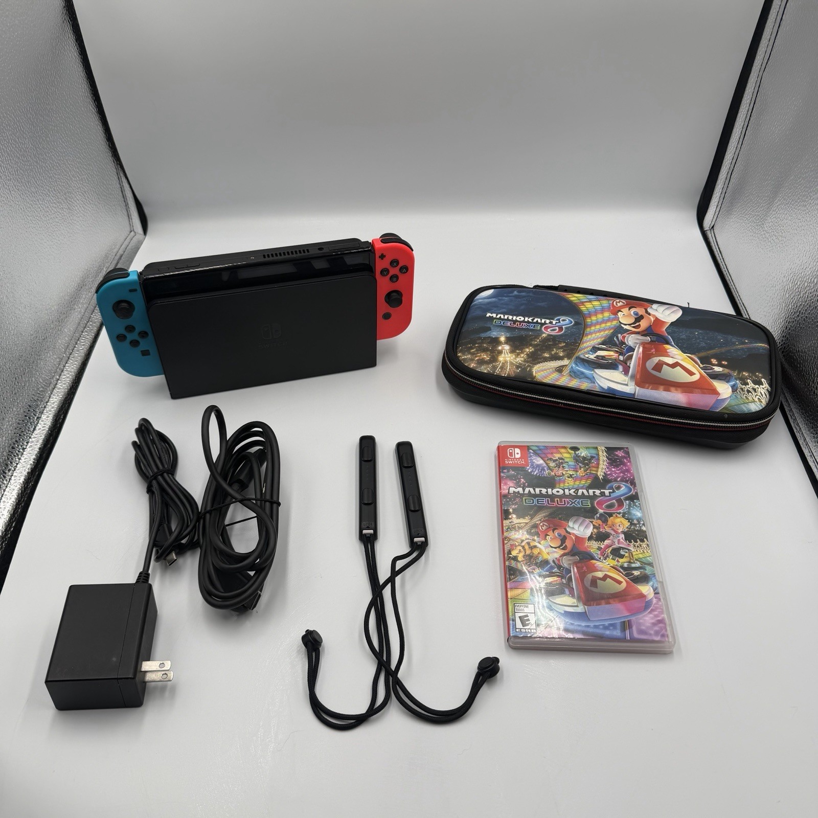 Nintendo Switch OLED Red & Blue Bundle Mario Kart 8 Deluxe