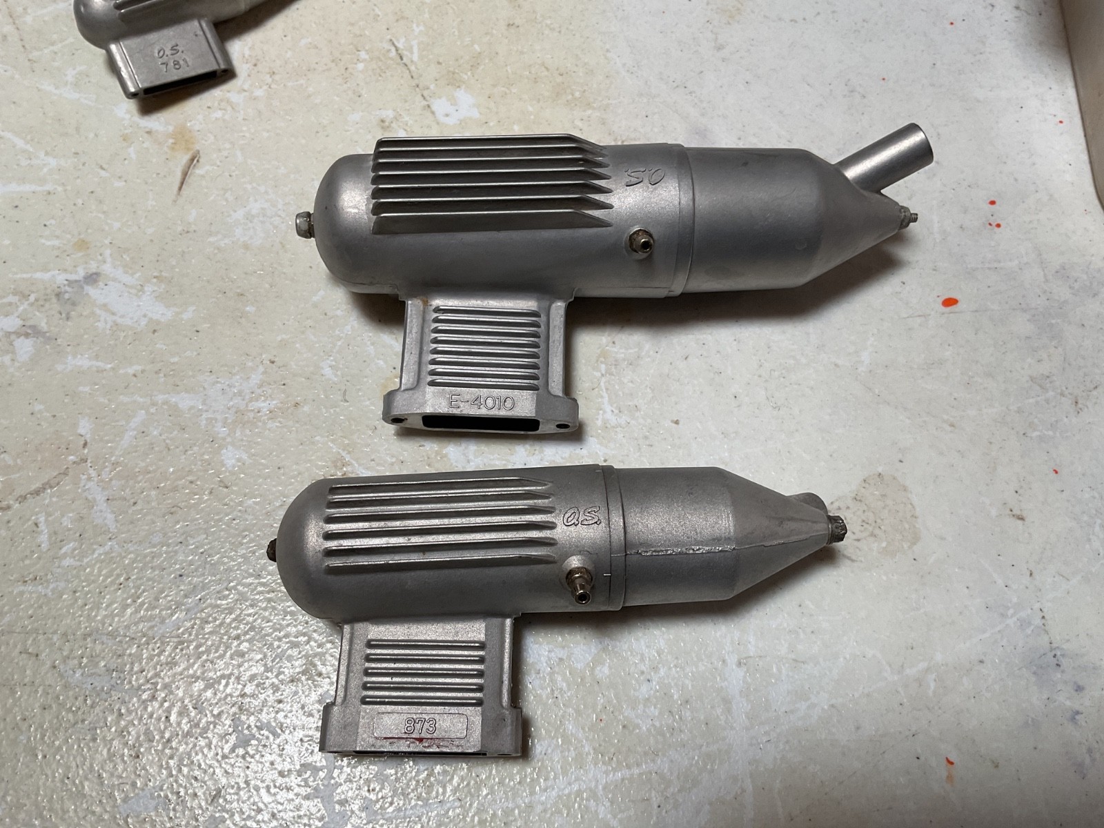 OS E-4010 and OS 873 Mufflers