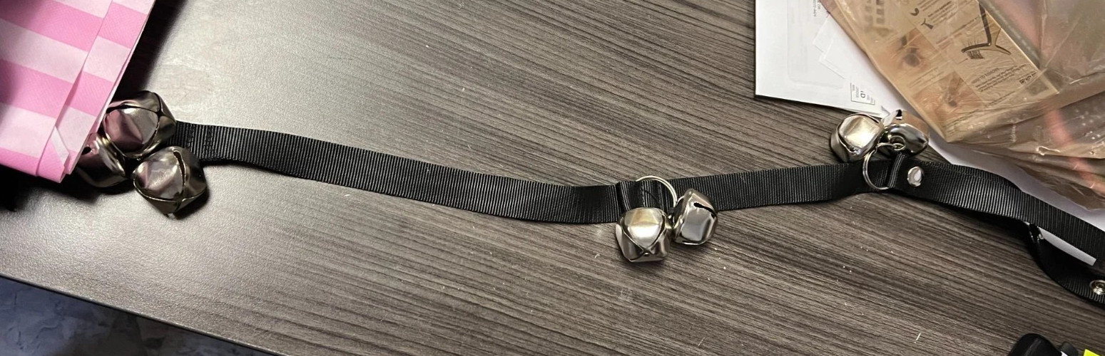 Door bell hanger - dog training