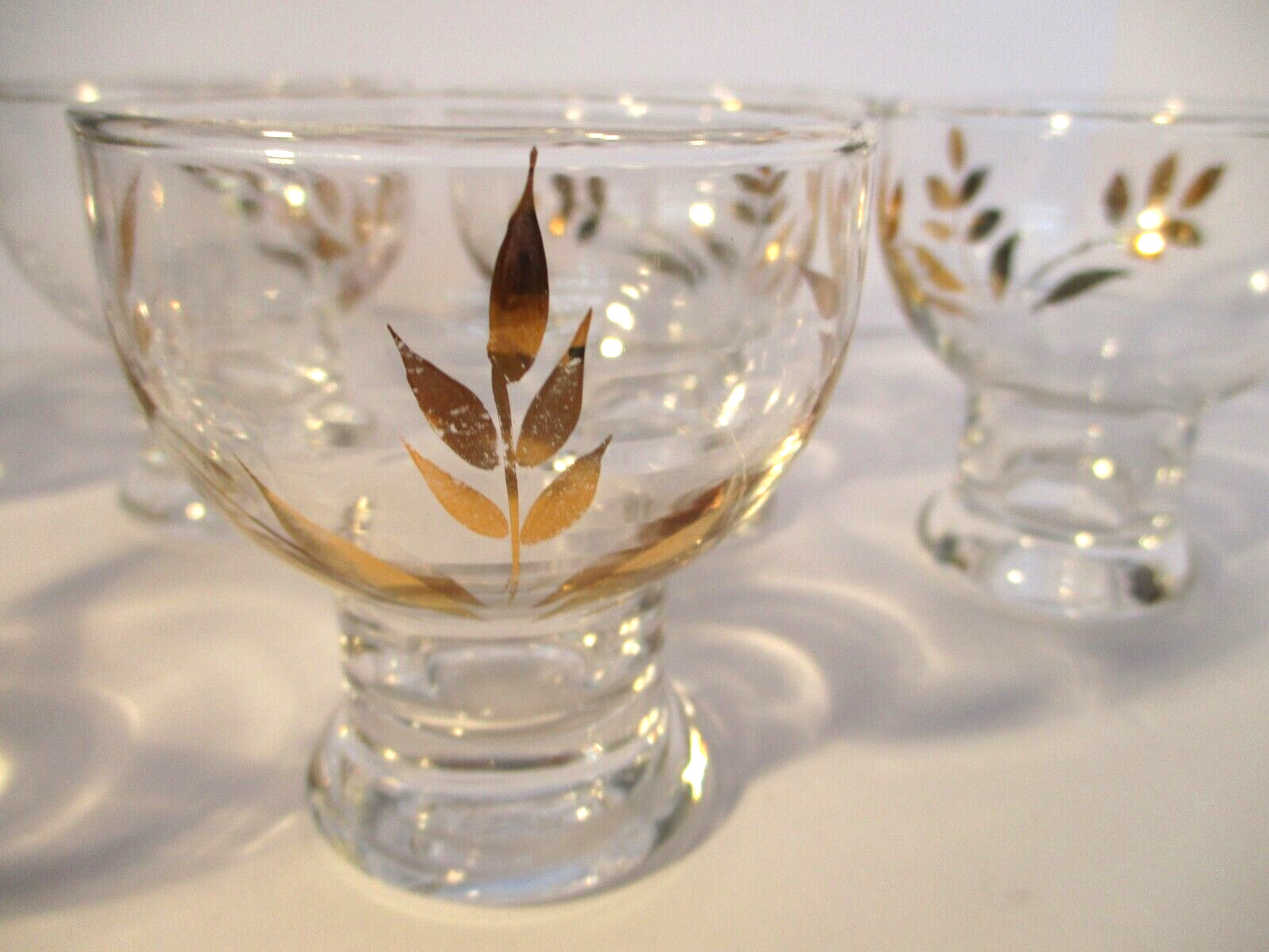 6 Liqueur Glasses with Gold Leaves and a Short Base Easy to Hold.