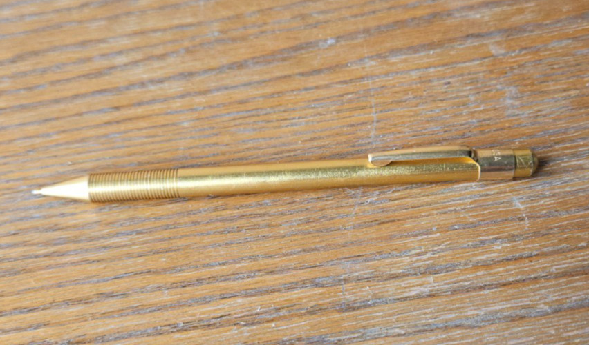 BRASS STYLUS. NICE DETAILED NON WRITING PEN. INCLUDES POCKET CLIP
