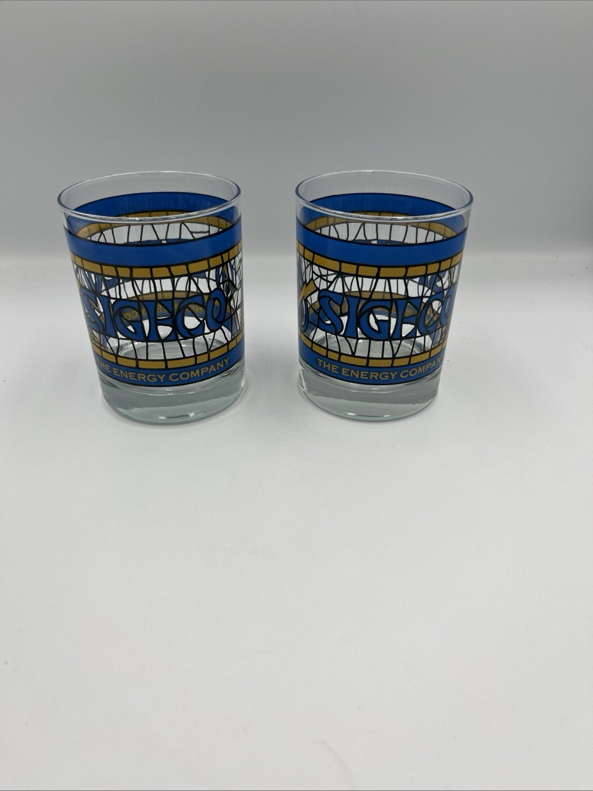 2 Sigeco The Energy Company Yellow And Blue Stained Glass Style Glasses