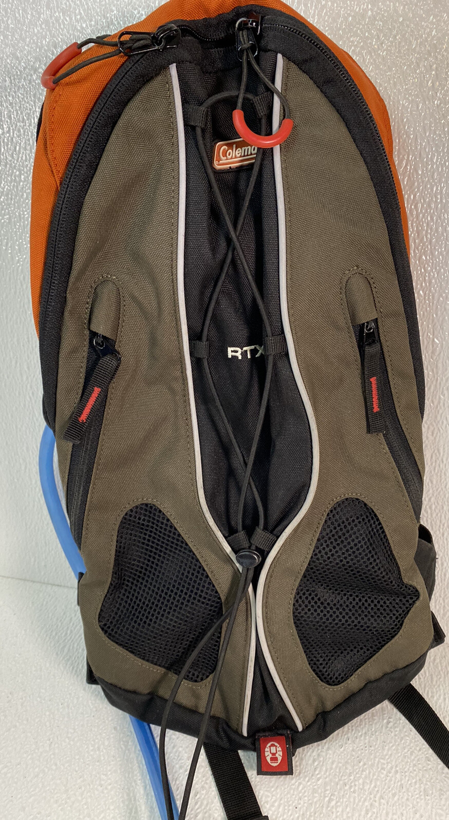 Coleman RTX 200 Hydration Pack W/ Backpack Storage Compartments Orange Gray