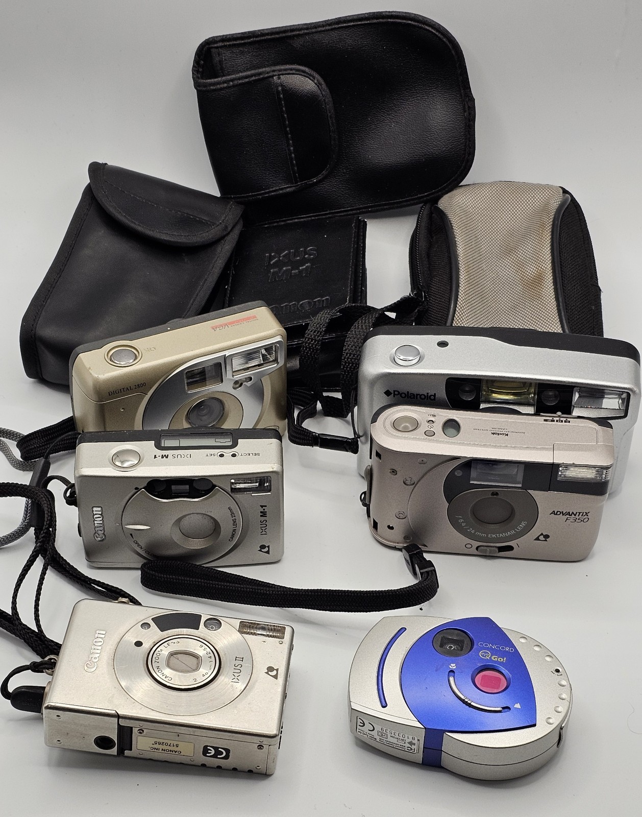 Mixed Lot Canon Polaroid Concord Film Cameras For Part Or Repairs
